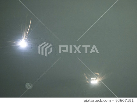 3D printer prints object from metal powder. Metal is sintered under laser into 3D shape in working chamber. Laser sintering machine for metal. Robotics work. Additive manufacturing metal 3D printer 93607191