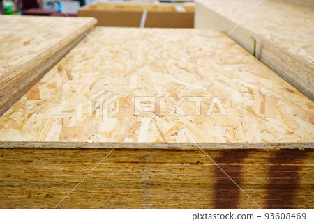 OSB board. sheet material is used in construction. hardware store. OSB board. sheet material is used in construction. hardware store. 93608469