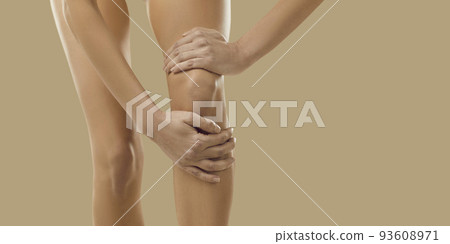 Woman suffer from pain in knee Woman suffer from pain in knee 93608971