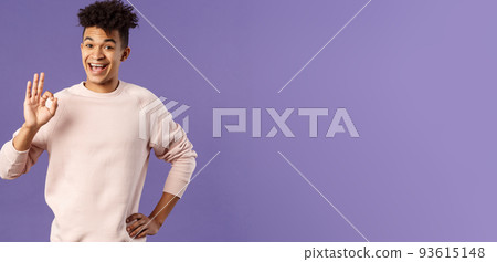 Relax its okay. Portrait of carefree, unbothered young man have everything under control, assure and guarantee job will be done, recommend product, being pleased, purple background 93615148