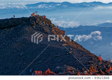 Climbers waiting for the sunrise at the summit of Mt.Fuji and the mountains of Okuchichibu 93621808