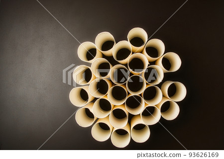 A large number of toilet paper cores collected for planting sweet pea seeds in the fall 93626169