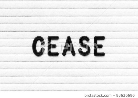 Black color letter in word cease on white felt board background Black color letter in word cease on white felt board background 93626696