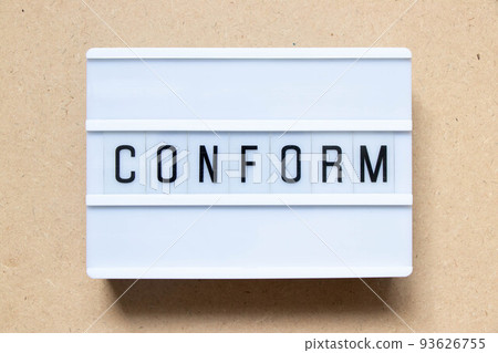 Lightbox with word conform on wood background 93626755