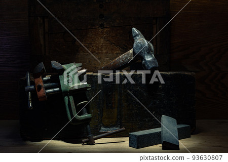 Old tools and a wooden box. Still life of tools. Low keys. Old tools and a wooden box. Still life of tools. Low keys. 93630807