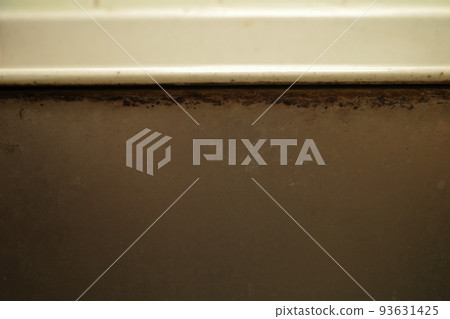 Black stains on the rim of the kitchen sink Black stains on the rim of the kitchen sink 93631425