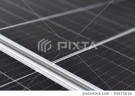 Rooftop solar power system. Black solar panels, close up view 93631616