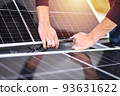 Connecting solar panels to each other. Rooftop solar power system mount, work. Green energy 93631622
