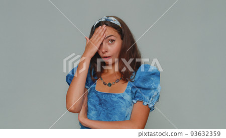 Upset pretty young woman making face palm gesture, feeling bored, disappointed in result, bad news 93632359