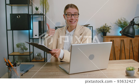 Businesswoman working on laptop at office talk on online communication video call with employee boss Businesswoman working on laptop at office talk on online communication video call with employee boss 93632427