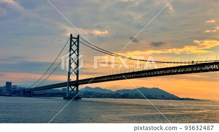 Akashi Kaikyo Bridge seen from the ferry early in the morning Akashi Kaikyo Bridge seen from the ferry early in the morning 93632487