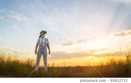 Woman with VR virtual reality goggles Woman with VR virtual reality goggles 93632731