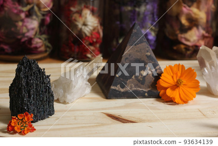 Quartz Crystals and Stone Pyramid With Flower. Relaxation and Meditation Decor Quartz Crystals and Stone Pyramid With Flower. Relaxation and Meditation Decor 93634139