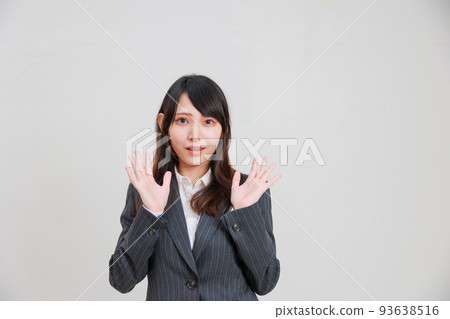 A woman cheering for the screen A woman cheering for the screen 93638516