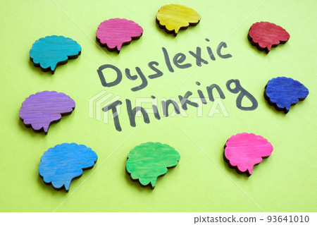 Dyslexic thinking sign and colorful brains around. 93641010