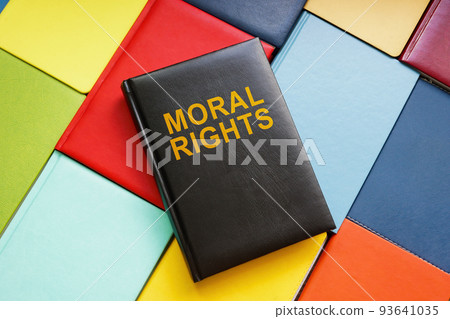 Books and book about moral rights on them. 93641035