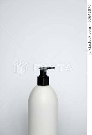 White cosmetic plastic bottle with black pump dispenser on white background. Liquid container for gel, lotion, cream, shampoo, bath foam. White cosmetic plastic bottle with black pump dispenser on white background. Liquid container for gel, lotion, cream, shampoo, bath foam. 93641076