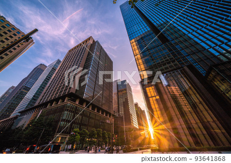 Tokyo cityscape in Japan Looking at the office buildings in front of Otemachi Station dyed in the setting sun = August 27 Tokyo cityscape in Japan Looking at the office buildings in front of Otemachi Station dyed in the setting sun = August 27 93641868