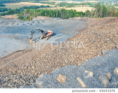 Heavy machinery in the clinkstone or phonolite mining quarry 93641976
