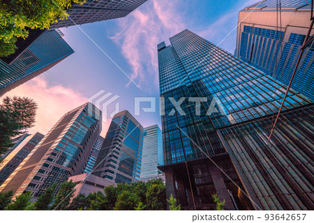 Tokyo cityscape in Japan Looking at the office buildings in front of Otemachi Station dyed in the setting sun = August 27 Tokyo cityscape in Japan Looking at the office buildings in front of Otemachi Station dyed in the setting sun = August 27 93642657