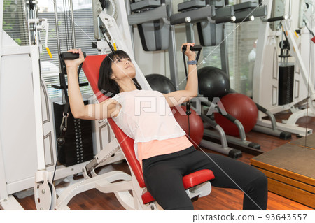 Women exercising at the gym 93643557