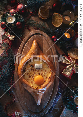 traditional georgian adjarian khachapuri with suluguni cheese, egg yolk, butter 93643574