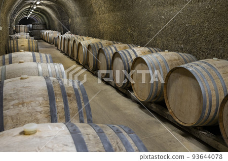 Wine cellars with barrels, traditional wine called Bikaver near Eger, Hungary 93644078