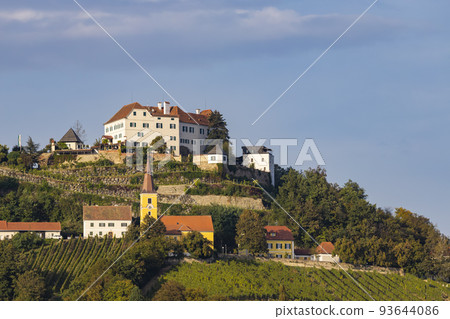 Kapfenstein castle and church with vineyard, Styria, Austria Kapfenstein castle and church with vineyard, Styria, Austria 93644086