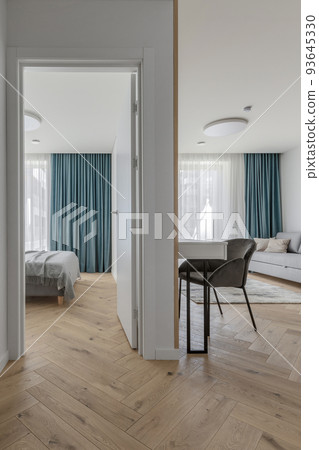 Modern minimalist interior design  with wooden furniture, oak floor in Scandinavian style.  Aesthetic simple interior design concept. 93645330