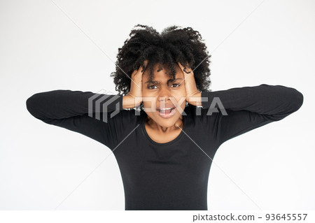 Portrait of depressed African American woman looking at camera Portrait of depressed African American woman looking at camera 93645557