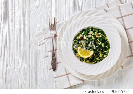 Spanakorizo, Greek spinach and rice pilaf in bowl 93645761