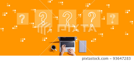 Question marks with person working with laptop 93647283