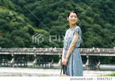 A woman traveling in Arashiyama, Kyoto A woman traveling in Arashiyama, Kyoto 93647917