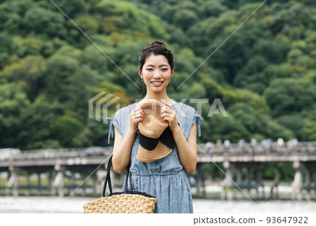 A woman traveling in Arashiyama, Kyoto A woman traveling in Arashiyama, Kyoto 93647922