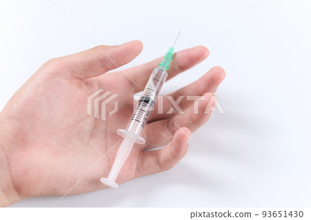 Asian hand with syringe Asian hand with syringe 93651430