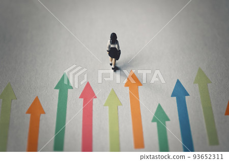 Miniature female student with colorful arrows 93652311