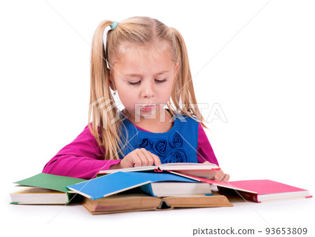 Little smart girl holding a book and reading it, on a white background Little smart girl holding a book and reading it, on a white background 93653809