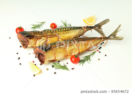 Concept of tasty food with smoked mackerel on white background 93654672