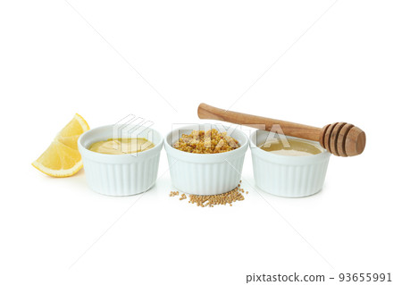 Bowls with sauces isolated on white background 93655991