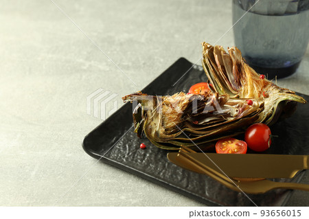 Concept of tasty food with grilled artichoke, space for text 93656015