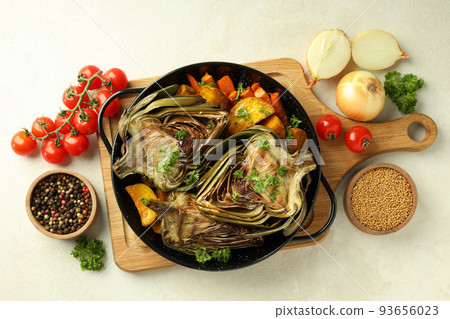 Concept of tasty food with grilled artichoke, top view Concept of tasty food with grilled artichoke, top view 93656023