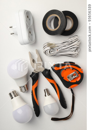 Concept of electrician or electrical tools, top view Concept of electrician or electrical tools, top view 93656389