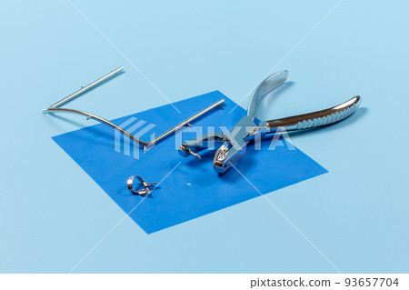 Dental hole punch, clamp, metal frame and rubber dam Dental hole punch, clamp, metal frame and rubber dam 93657704