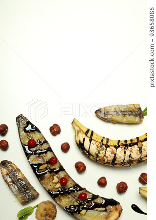 Concept of tasty dessert with banana and grilled banana Concept of tasty dessert with banana and grilled banana 93658088