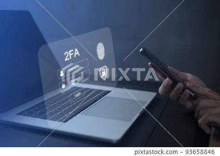 Person using laptop and touching virtual screen for two-factor authentication for safety use of social networks and access to information privacy Person using laptop and touching virtual screen for two-factor authentication for safety use of social networks and access to information privacy 93658846