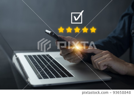 Satisfaction and customer service survey concept, business people using smartphone. to answer the questionnaire And the satisfaction rating, the satisfaction rating with the icon 5 stars. Satisfaction and customer service survey concept, business people using smartphone. to answer the questionnaire And the satisfaction rating, the satisfaction rating with the icon 5 stars. 93658848