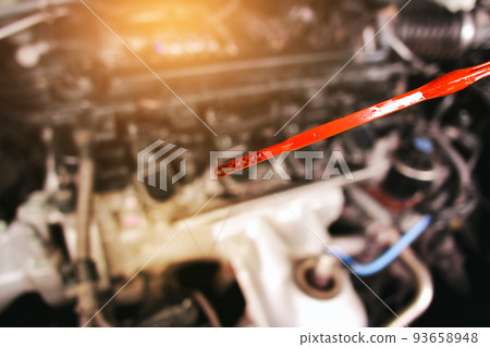 Deteriorating car oil on dipstick 93658948