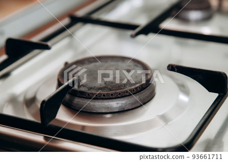 The gas burner is turned off in the kitchen in the apartment The gas burner is turned off in the kitchen in the apartment 93661711