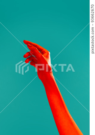 Female hand reaching up isolated on cyan color background in red neon light. Concept of relationship, community, care, support, symbolism, culture Female hand reaching up isolated on cyan color background in red neon light. Concept of relationship, community, care, support, symbolism, culture 93662670