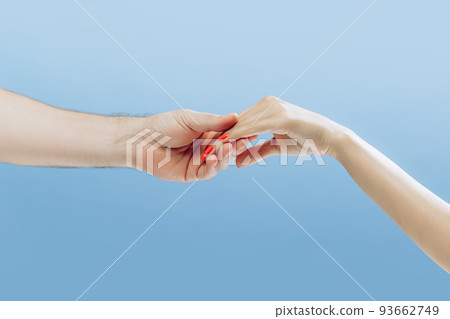 Touch. Graceful female hands gesturing isolated on blue background. Concept of relationship, feelings, community, care, support, symbolism, art 93662749